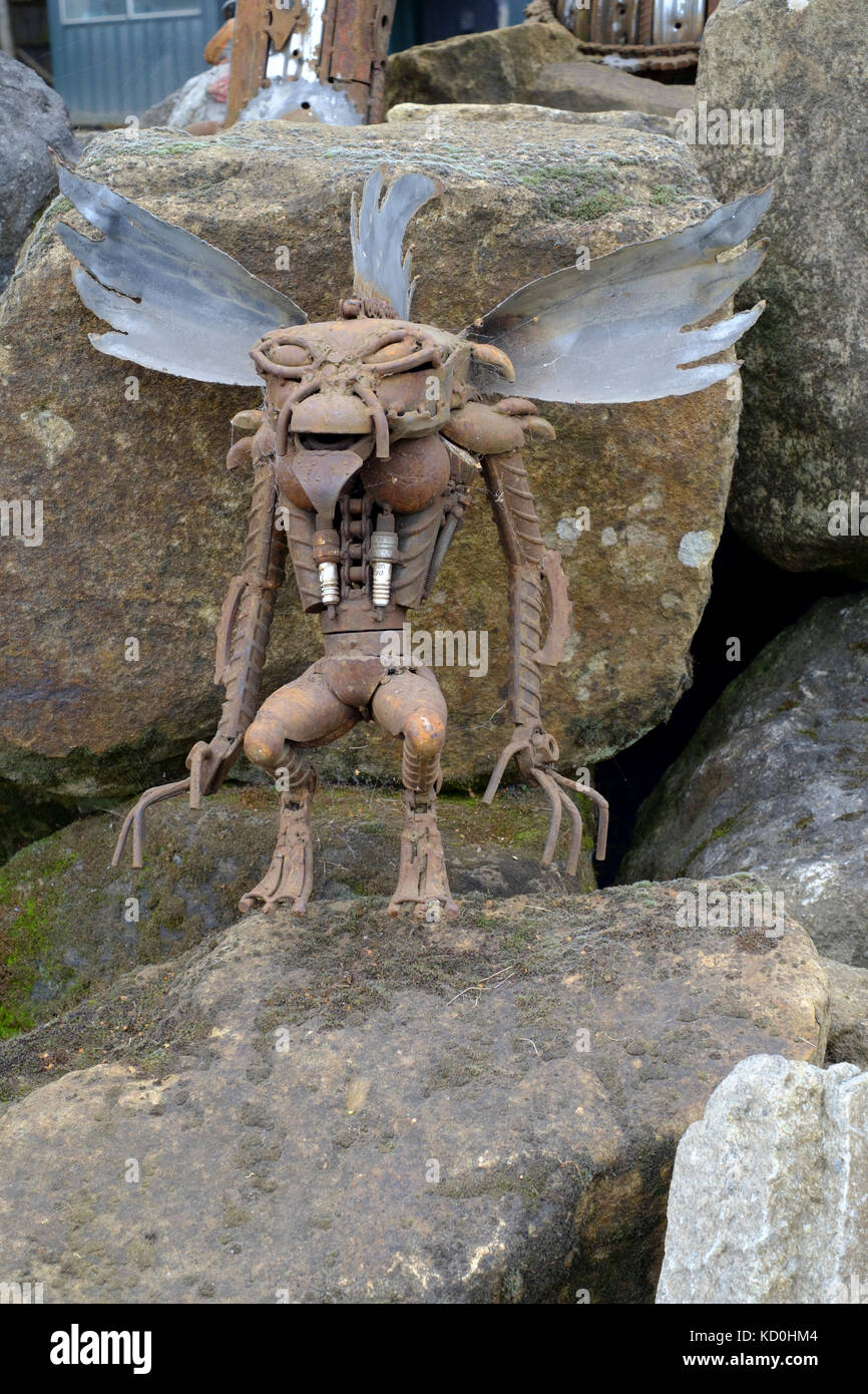 alien sculpture made from scrap car parts at a1 car spares scrapyard at