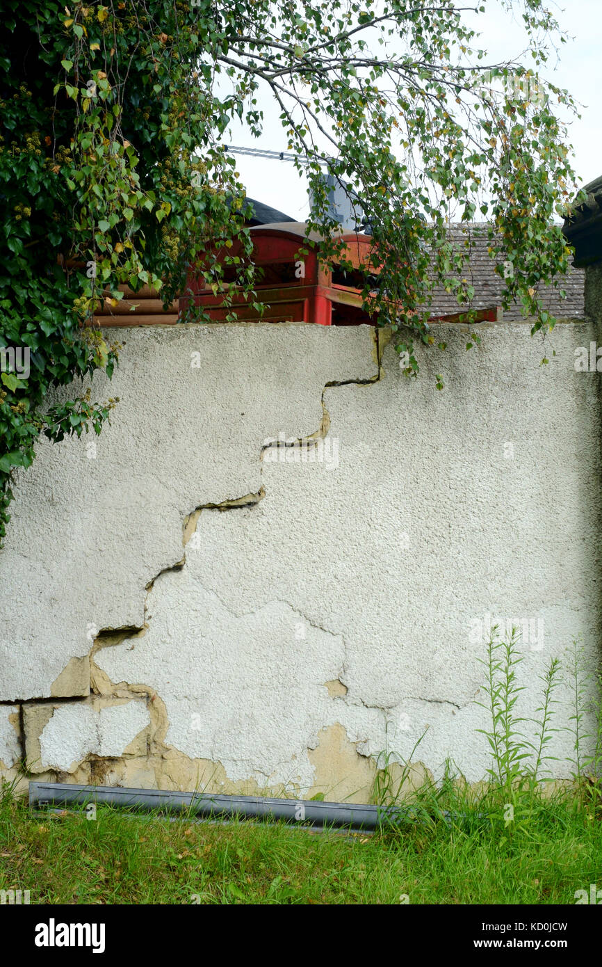 old traditional british red telephone box languishing in the corner of