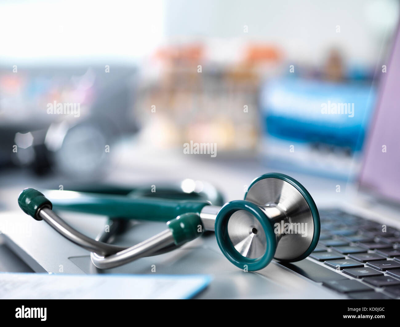Stethoscope on doctors desk in a clinic Stock Photo