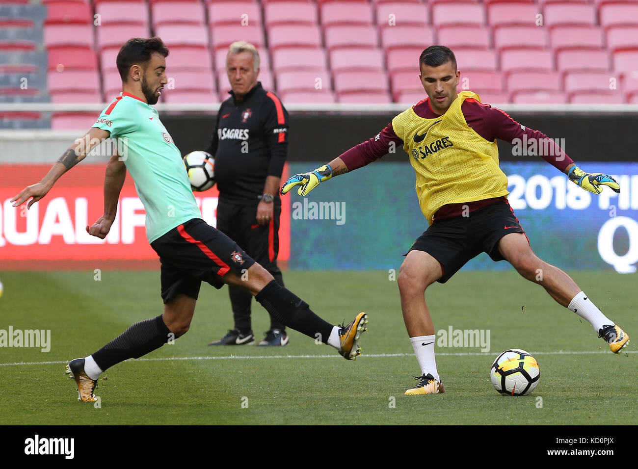 Lisbon, Portugal. 08th Oct, 2017. Portugal«s goalkeeper Anthony Lopes (R) and Portugal«s midfielder Bruno Fernandes (L) in action during National Team Training session before the match between Portugal and Switzerland at Luz Stadium in Lisbon on October 8, 2017. ( Credit: Bruno Barros/Alamy Live News Stock Photo