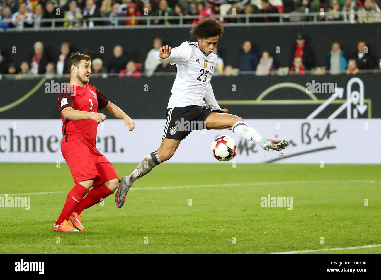 Kaiserslautern, Germany. 8th Oct, 2017. Leroy Sane (R) of Germany shoots during the FIFA 2018 World Cup Qualifiers Group C match between Germany and Azerbaijan at Fritz Walter Stadium in Kaiserslautern, Germany, on Oct. 8, 2017. Germany won 5-1. Credit: Ulrich Hufnagel/Xinhua/Alamy Live News Stock Photo