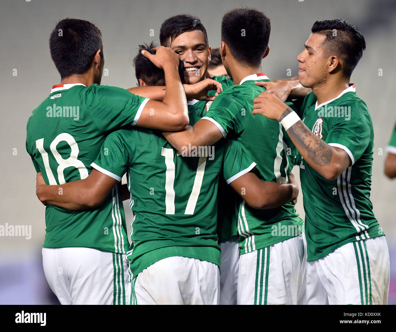 Doha, Qatar. 8th Oct, 2017. Edurado Danial Lara (2nd L) of Mexico celebrates with his teammates after scoring the second goal against Qatar during their Olympic team International Friendly match between Qatar and Mexico at the Al Sadd SC Stadium in Doha, Qatar, on Oct. 8, 2017. The match ended up with a 2-2 draw. Credit: Nikku/Xinhua/Alamy Live News Stock Photo