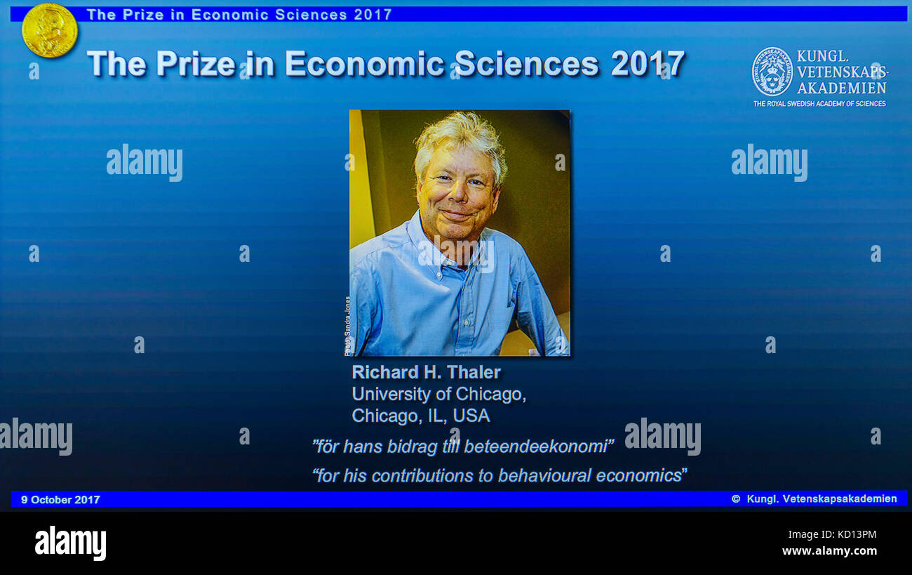 Stockholm, Sweden. 9th Oct, 2017. Photo of Richard H. Thaler is displayed on the screen during the press conference to announce the winner of the 2017 Nobel Prize in Economics in Stockholm, Sweden, on Oct. 9, 2017. The 2017 Nobel Prize in Economics, or officially the Sveriges Riksbank Prize in Economic Sciences in Memory of Alfred Nobel, was awarded to Richard H. Thaler 'for his contributions to behavioural economics,' announced the Royal Swedish Academy of Sciences here on Monday. Credit: Shi Tiansheng/Xinhua/Alamy Live News Stock Photo
