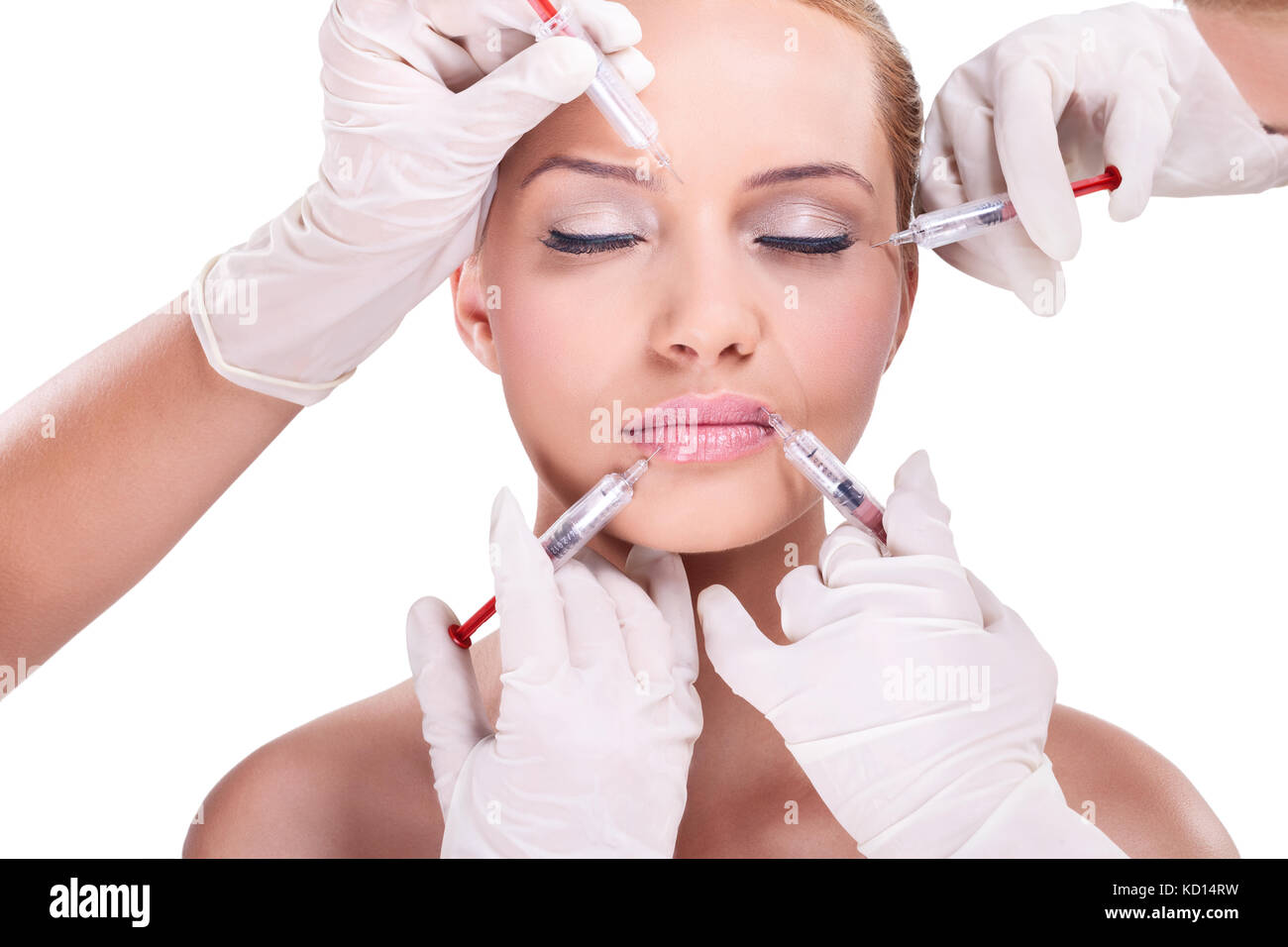 Plastic surgeons giving injection of botox Stock Photo Alamy
