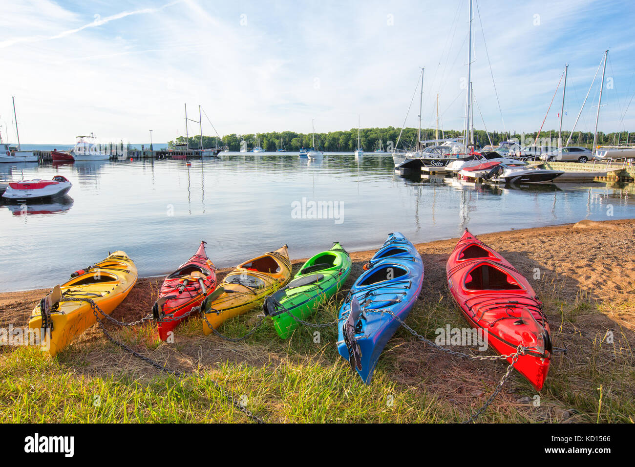 Kayaks on waterfront, Baddeck, Cape Breton, Nova Scotia, Canada Stock Photo