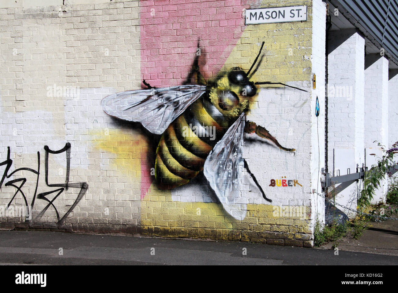 Mason Street with symbolic worker bee street art in the Northern Quarter of Manchester Stock Photo