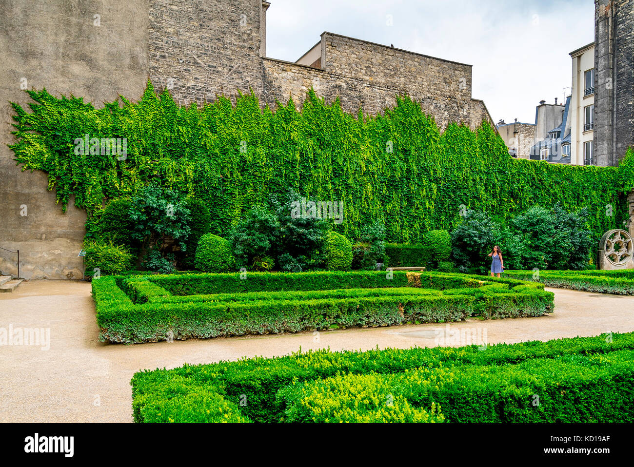 Beautiful garden within the Hôtel de Sully. The Hôtel de Sully is a Louis XIII style private mansion within the Marais area of Paris. Stock Photo