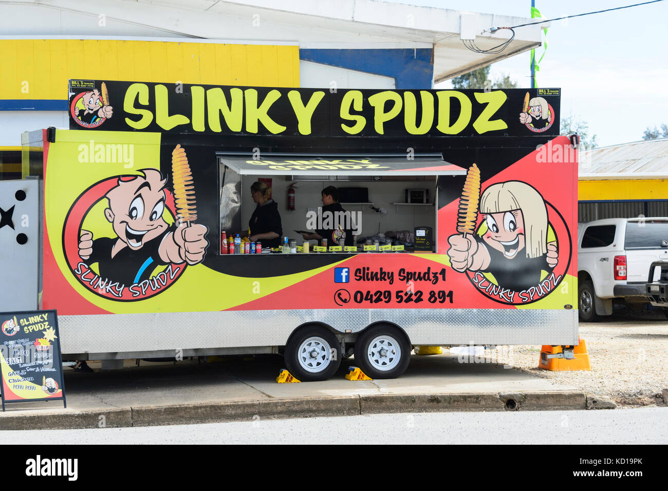 Food van selling spiralled potatoes Slinky Spudz, in the small rural town of Lockhart, New South Wales, NSW, Australia Stock Photo
