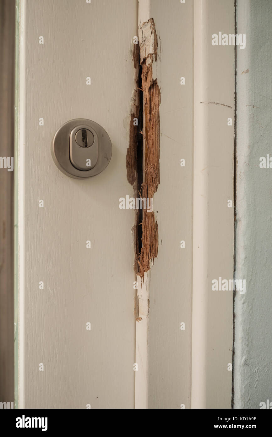 Damaged door frame after a burglary Stock Photo Alamy