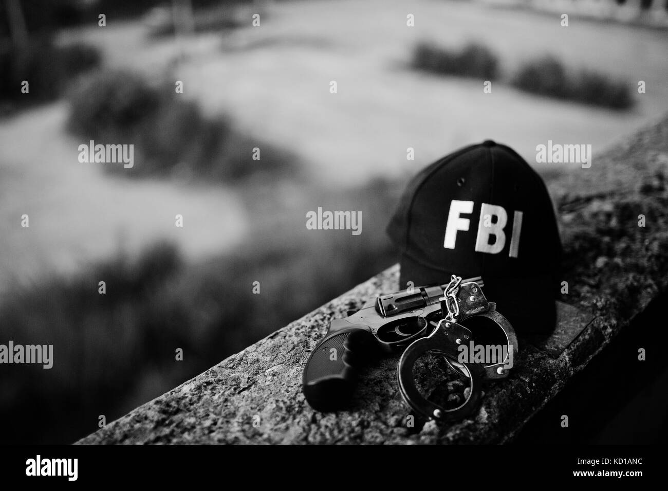 FBI cap with revolver and handcuff. Stock Photo