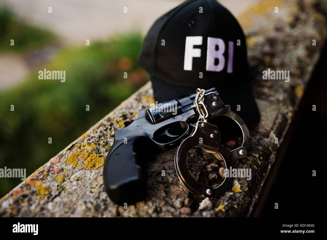 FBI cap with revolver and handcuff. Stock Photo