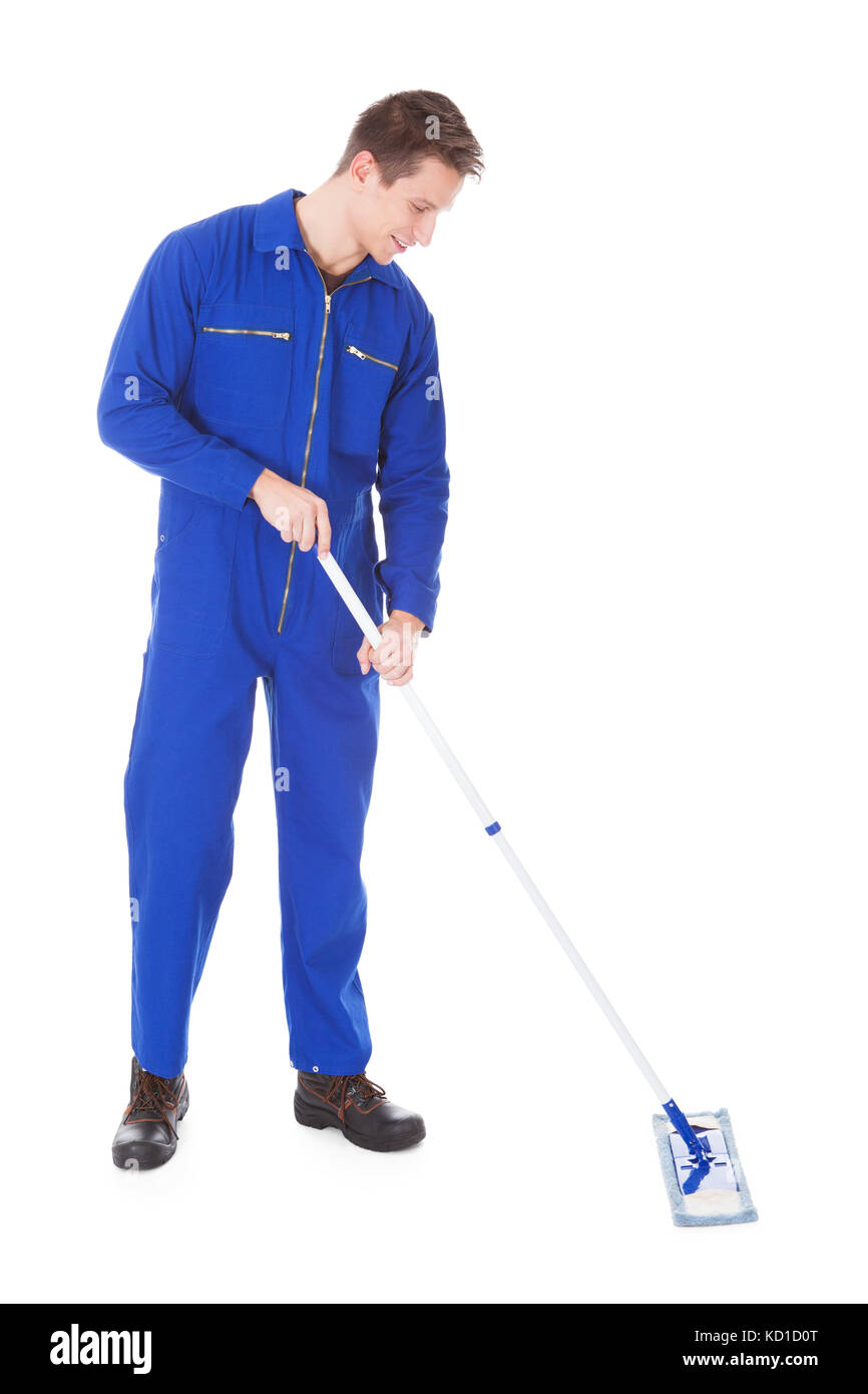 young-male-worker-in-boilersuit-cleaning-floor-with-mop-stock-photo-alamy