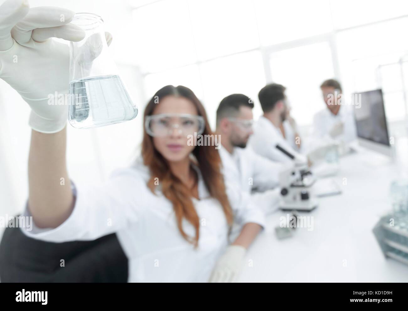 group of young scientists working in the laboratory Stock Photo - Alamy