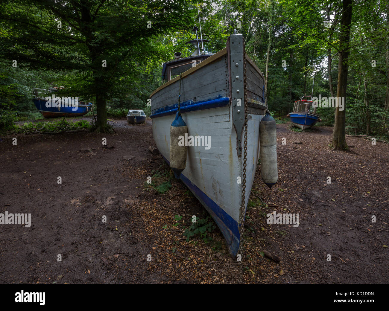 A flotilla of abandoned fishing boats in Leigh Woods nr Bristol.An exhibition named 'withdrawn' by artist Luke Jerram. Stock Photo