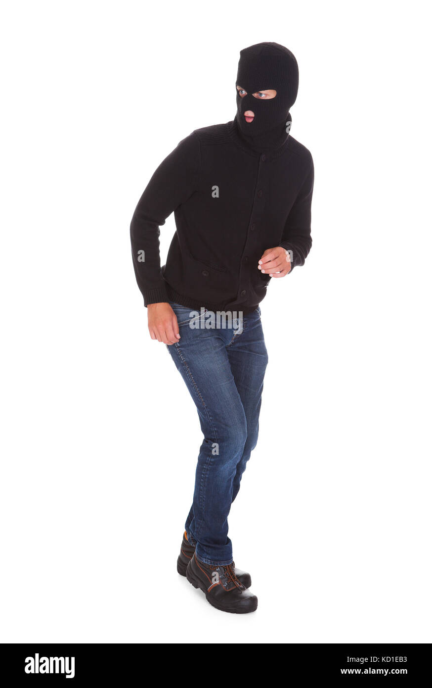 Portrait Of A Burglar Standing Isolated On White Background Stock Photo