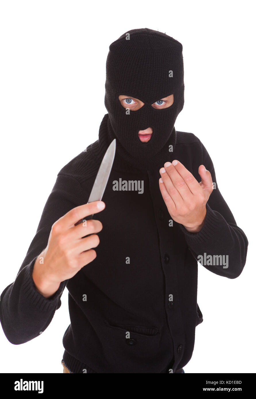 Burglar Man In Balaclava Holding Knife Isolated On White Background