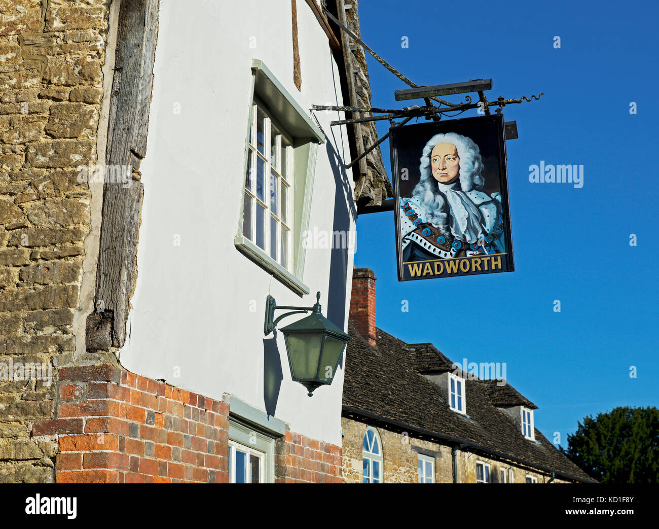 Pub sign of the George Inn, in the village of Lacock, Wiltshire, England UK Stock Photo