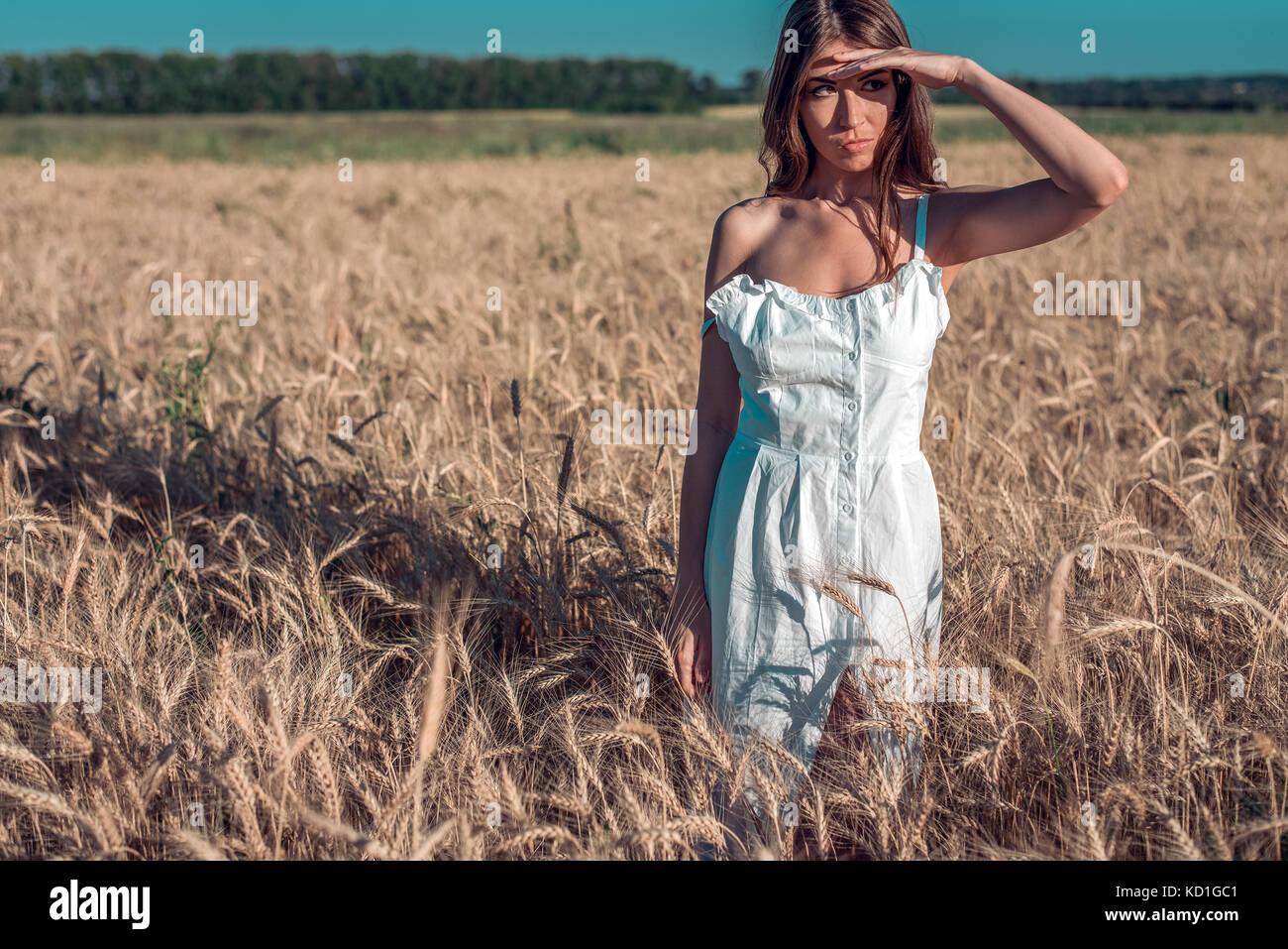 Girl in a white dress field, wheat outdoor recreation, beautiful dress