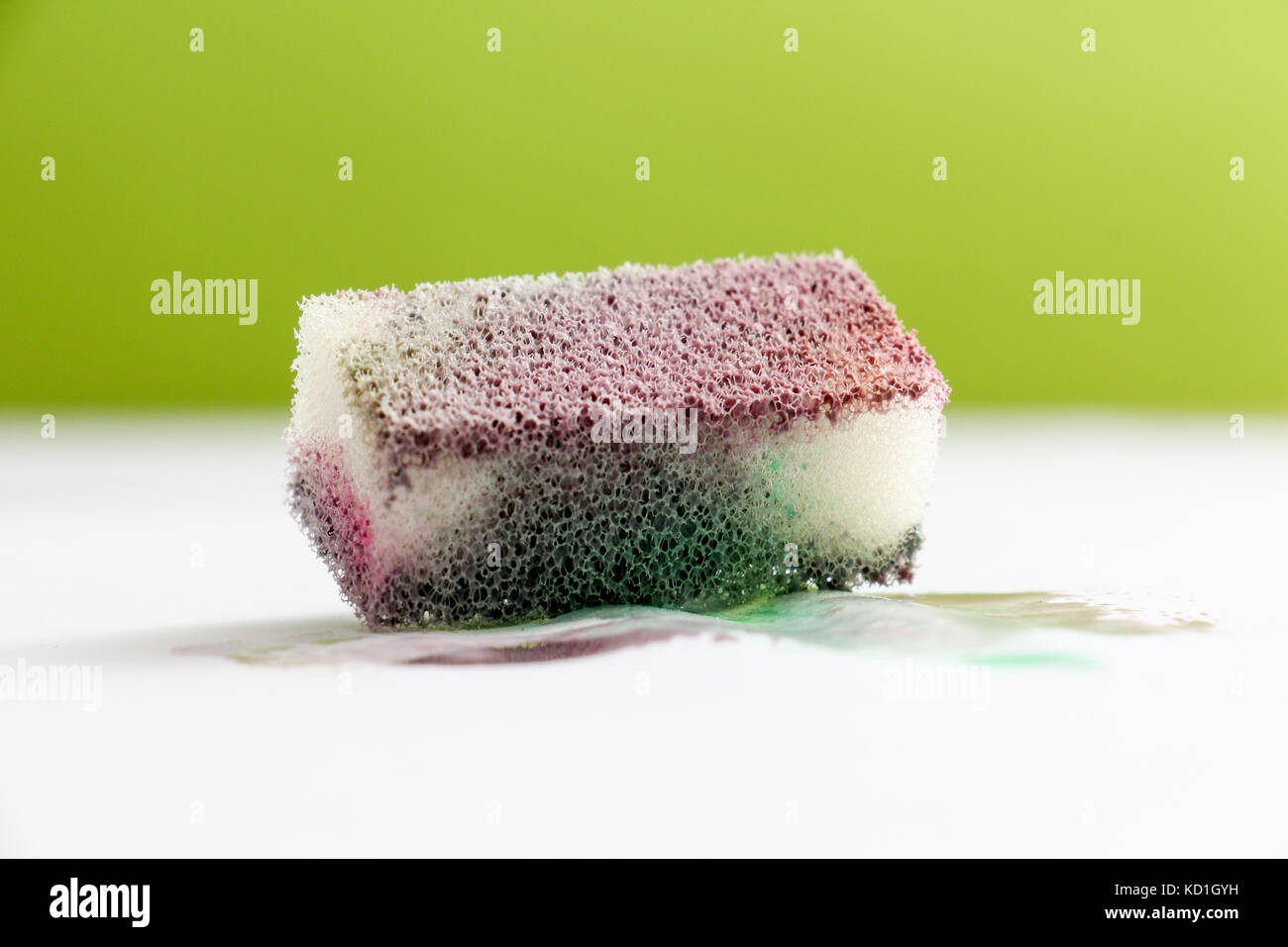 picture of a Sponge with watercolor paint. color concept Stock Photo