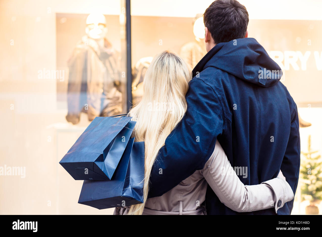 Couple looking at shopping window  Stock Photo