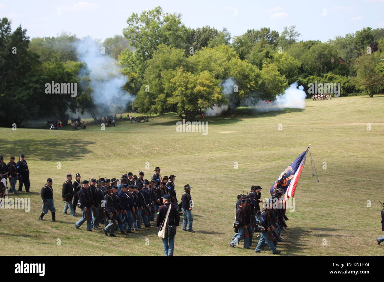 A civil war battle in Michigan at a festival with union and confederate