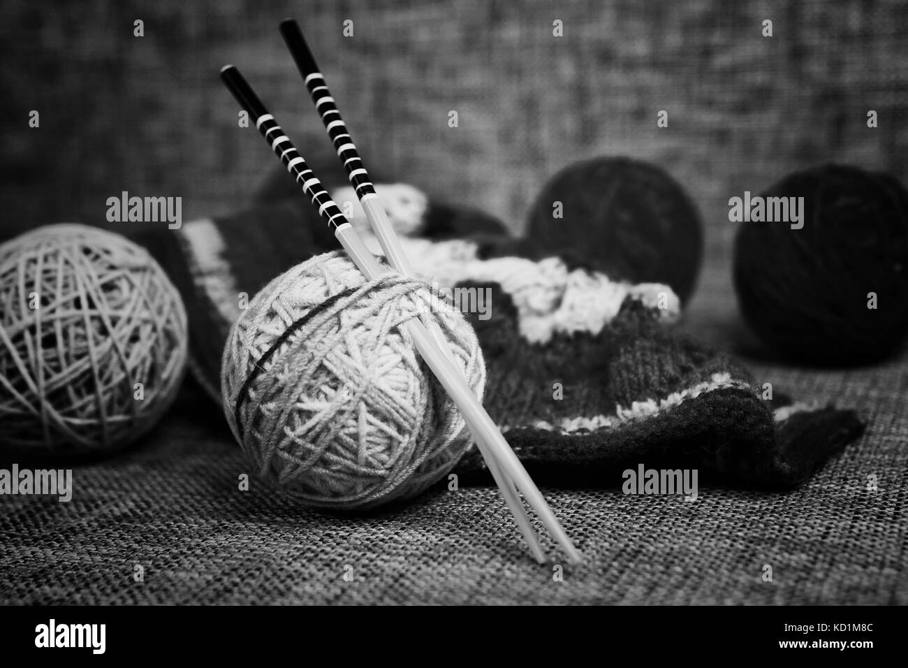embroidery wool balls and knitting needles Stock Photo Alamy