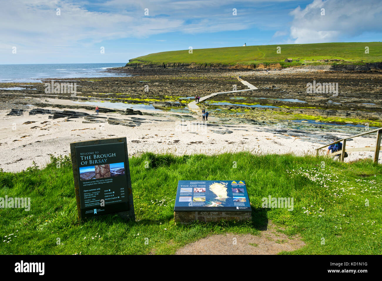 Information signs at the causeway leading to the tidal island of the Brough of Birsay, Orkney, Scotland, UK. Stock Photo