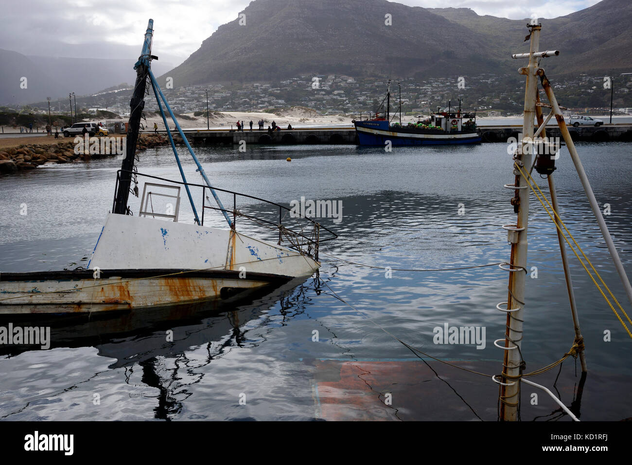 Sunken boat in Hout Bay harbour, Cape Town, South Africa Stock Photo