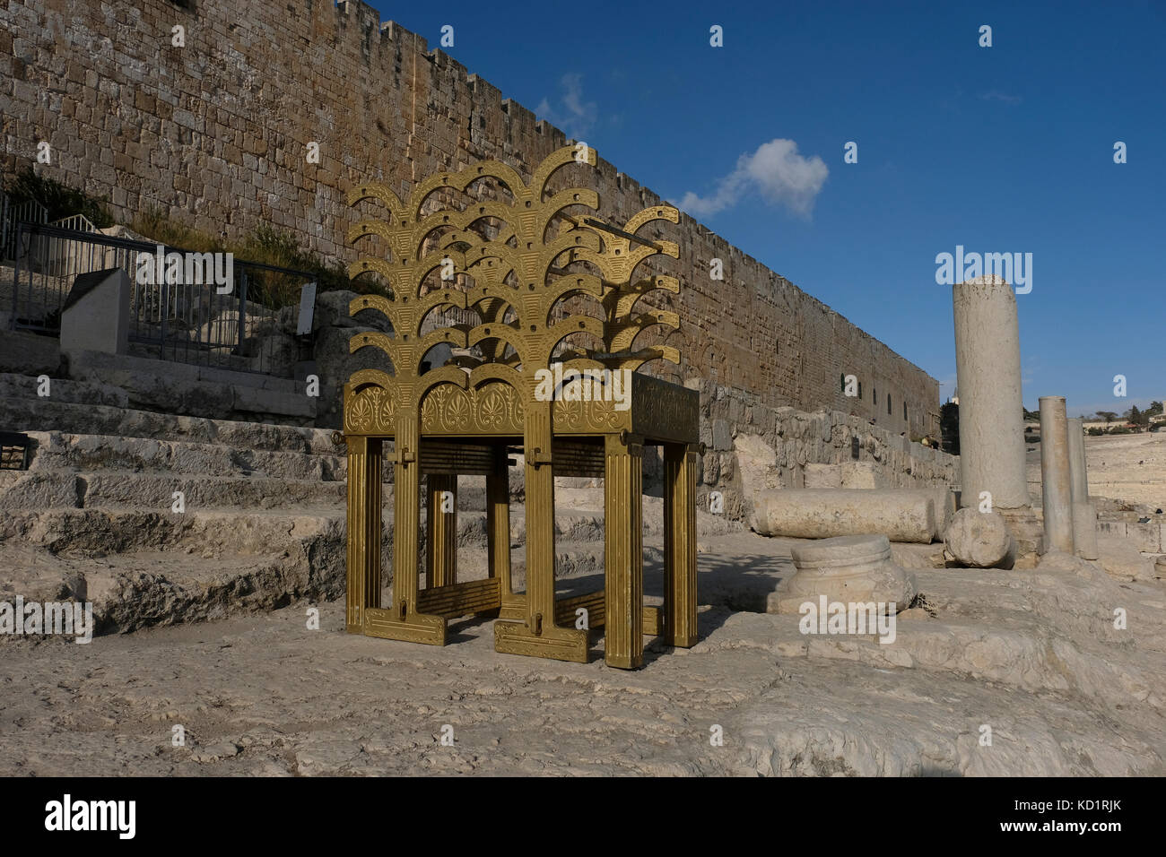 Model of the gilded Temple Showbread or in Hebrew Lechem Hapanim which was used during the Jewish holy temples period for ritual worship revived by the Jerusalem Temple Institute is seen at the southern wall of Haram al Sharif in the ancient Ophel ruins in Jerusalem Archeological Park, Old City East Jerusalem Israel on 08 October 2017. The Temple Institute known in Hebrew as Machon HaMikdash is an organization focusing on the endeavor of building the third Jewish Temple on the site currently occupied by the Dome of the Rock, and to reinstate sacrificial worship. Stock Photo