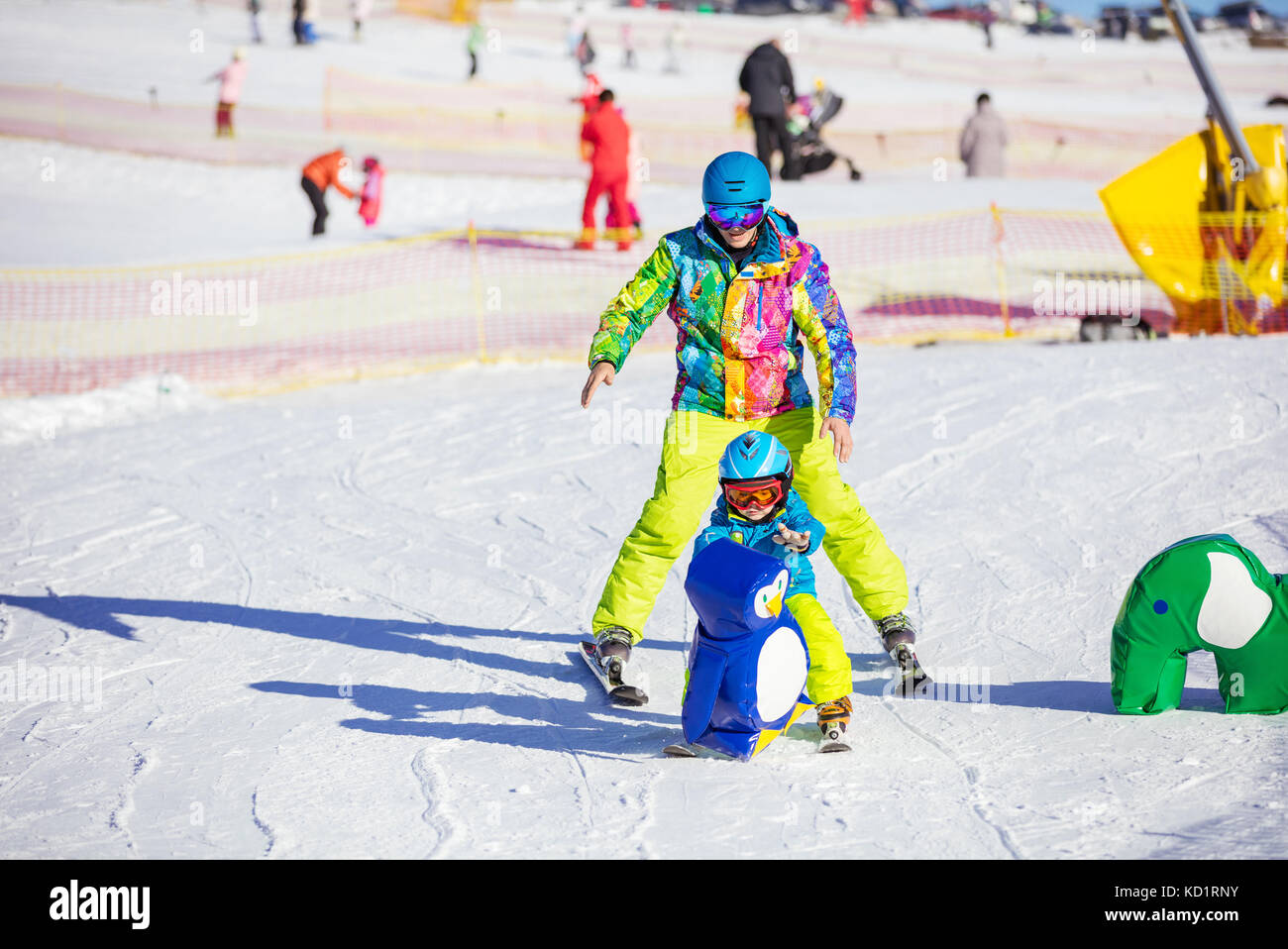 Miniature people, Skier playking ski on snow stream. Image use for sport  ,travel concept. Stock Photo