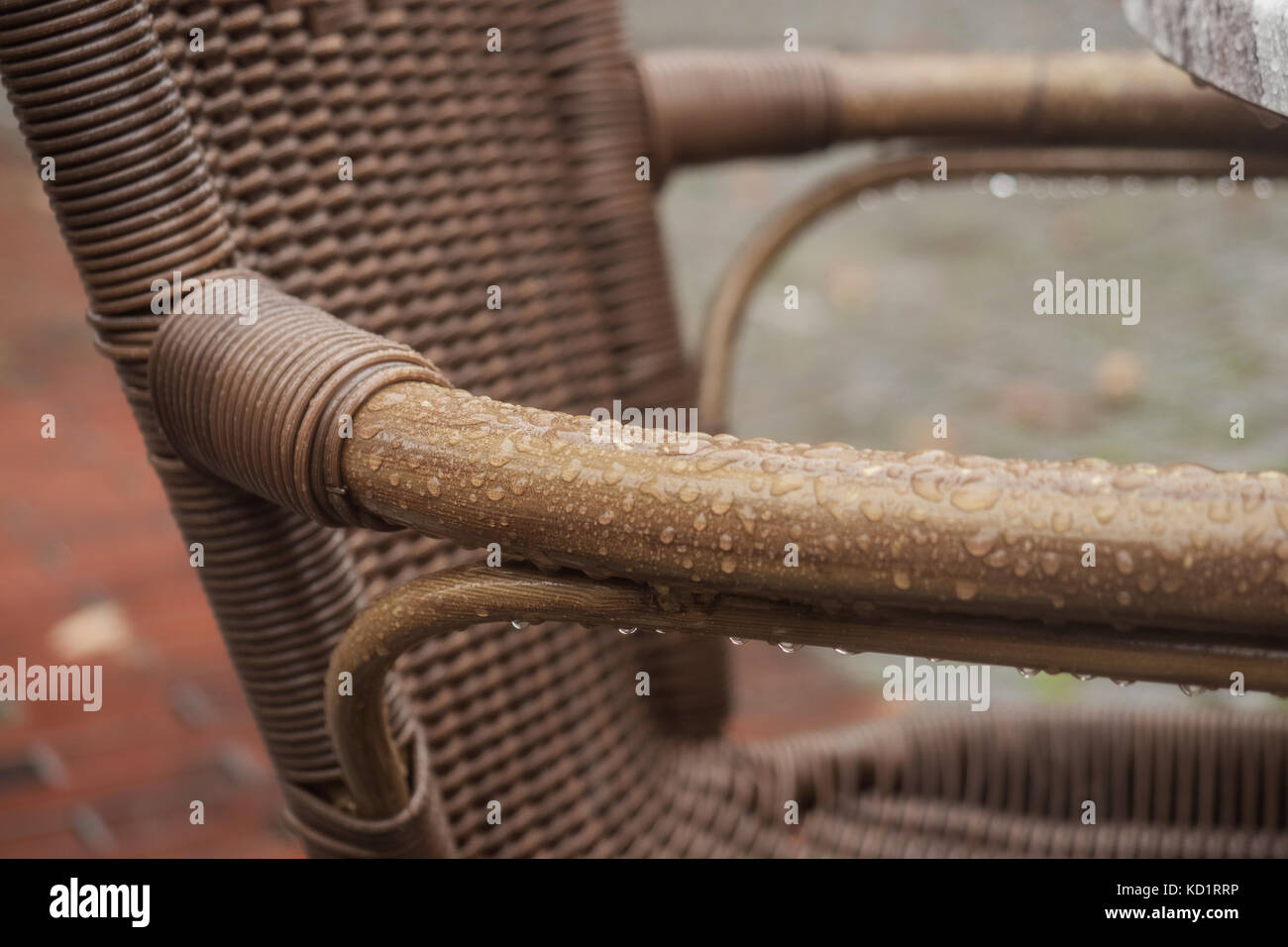 Wet chair after the rain in the street cafe Stock Photo Alamy