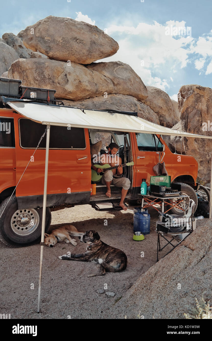 MEET the couple who do every adventure from abseiling to travelling the globe with their pair of loyal pooches. Incredible images and video footage sh Stock Photo