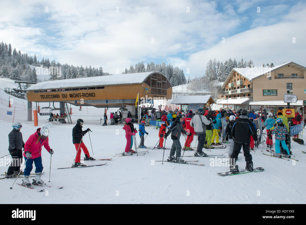 Skiers entering the Telecombi du Mont-Rond, Jura, Ain Rhone-Alpes, France Stock Photo