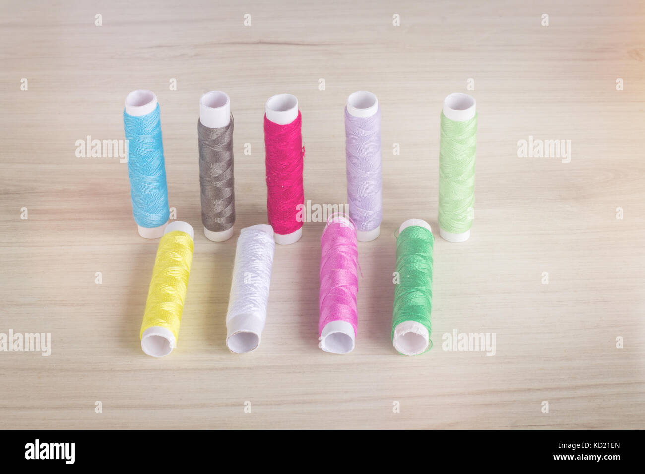 colored threads on the table. Stock Photo