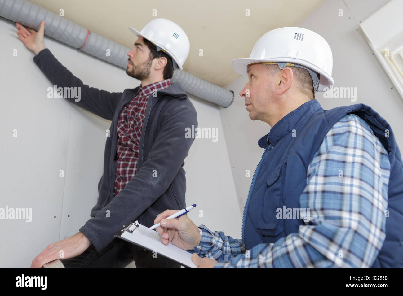 contractor manager inspecting the works done Stock Photo - Alamy