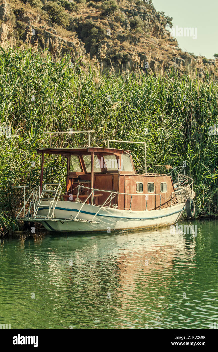 Abandoned boat in Dalyan river Turkey Stock Photo