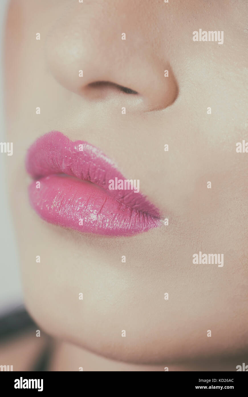 Close up of a woman's lips wearing lipstick Stock Photo