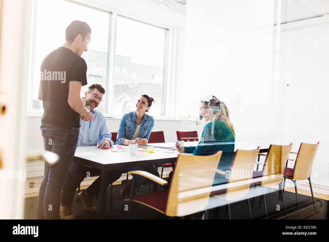 Colleagues talking during business meeting Stock Photo