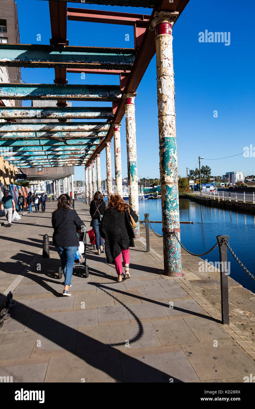 The peeling paint on a dockside warehouse at ipswich gives a clue to