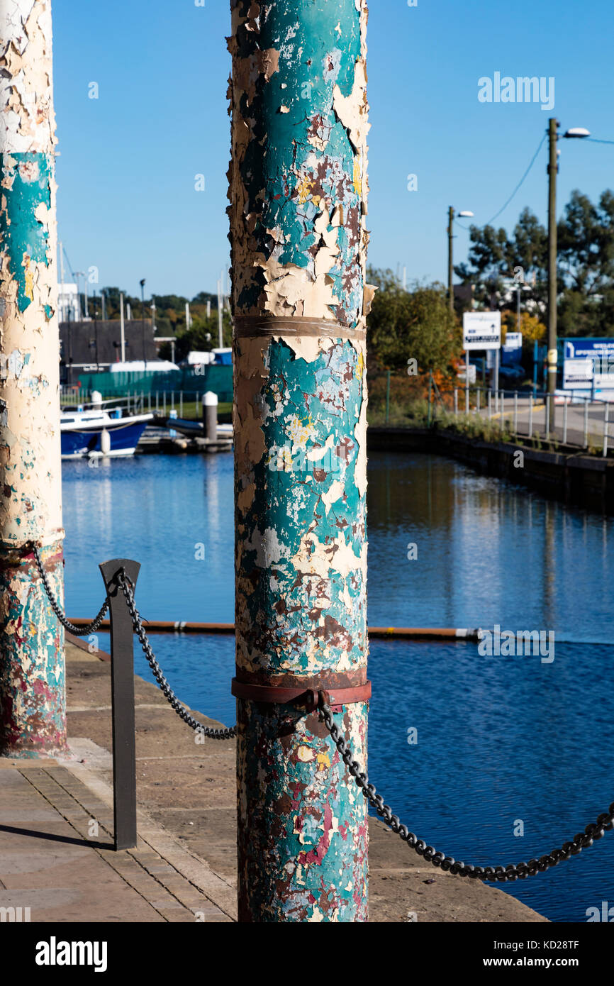 The peeling paint on a dockside warehouse at ipswich gives a clue to