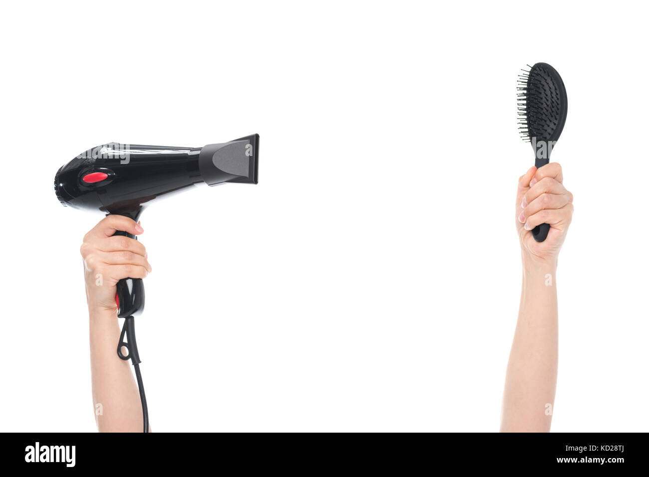 hands holding hairbrush and hairdryer Stock Photo Alamy