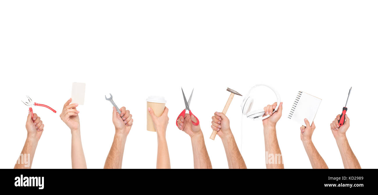 hands holding tools and objects Stock Photo Alamy