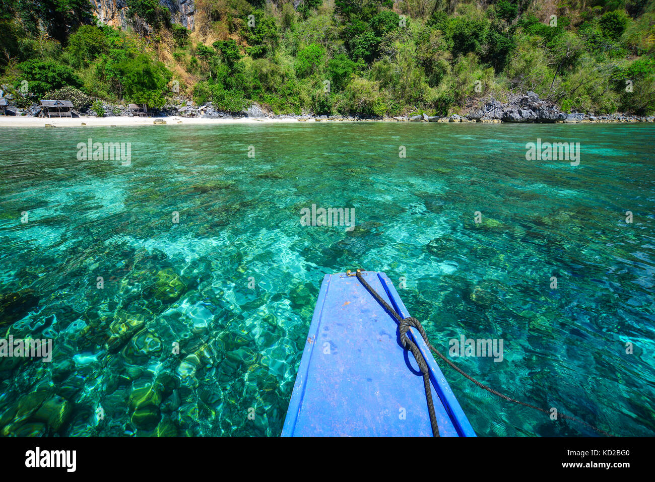 Wooden boat floating on Coron Island, Philippines. Coron is known for several Japanese shipwrecks of World War II vintage. Stock Photo