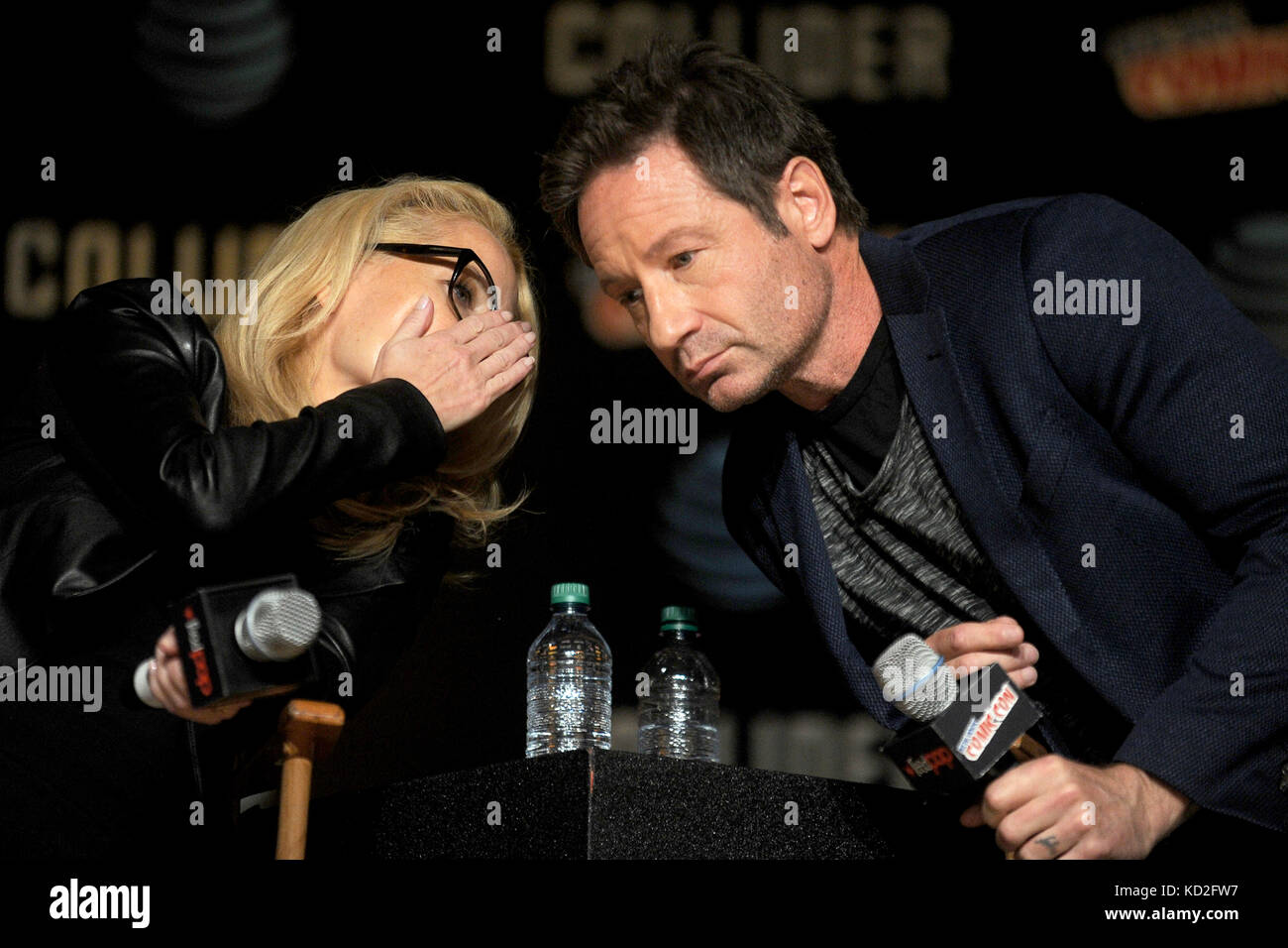 New York, USA. 8th Oct, 2017. Gillian Anderson and David Duchovny speak at The X-Files panel during the New York Comic Con 2017 at Javits Center on October 8, 2017 in New York City. Credit: Geisler-Fotopress/Alamy Live News Stock Photo