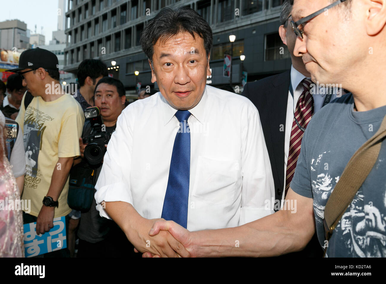 Tokyo, Japan. 10th Oct, 2017. Yukio Edano, leader of the Constitutional Democratic Party of Japan, shakes hands with supporters during a campaign event outside Ikebukuro Station on October 10, 2017, Tokyo, Japan. Edano, head of the newly created Constitutional Democratic Party (CDP) attended a campaign event to support his party's candidate Yosuke Suzuki. Campaigning officially started on October 10 for the October 22 election. Credit: Rodrigo Reyes Marin/AFLO/Alamy Live News Stock Photo