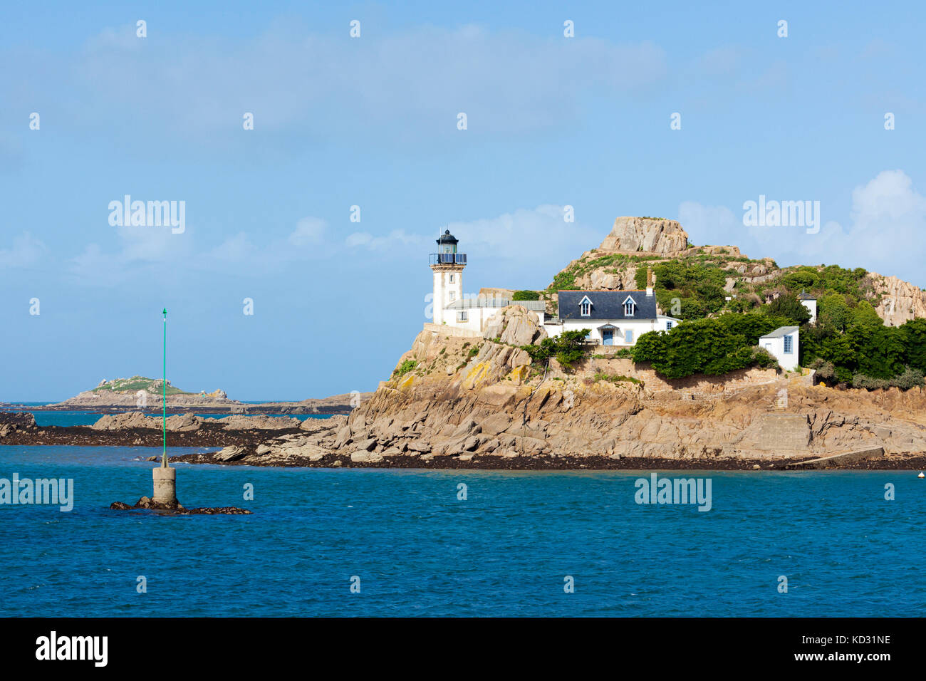 Lighthouse on Louët island in the bay of Morlaix off Carantec, Cote d ...