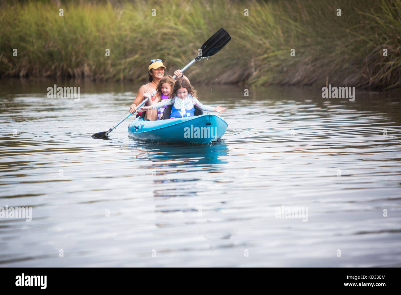 Mother and daughters kayaking in Halls River, Homosassa, Florida, US Stock Photo