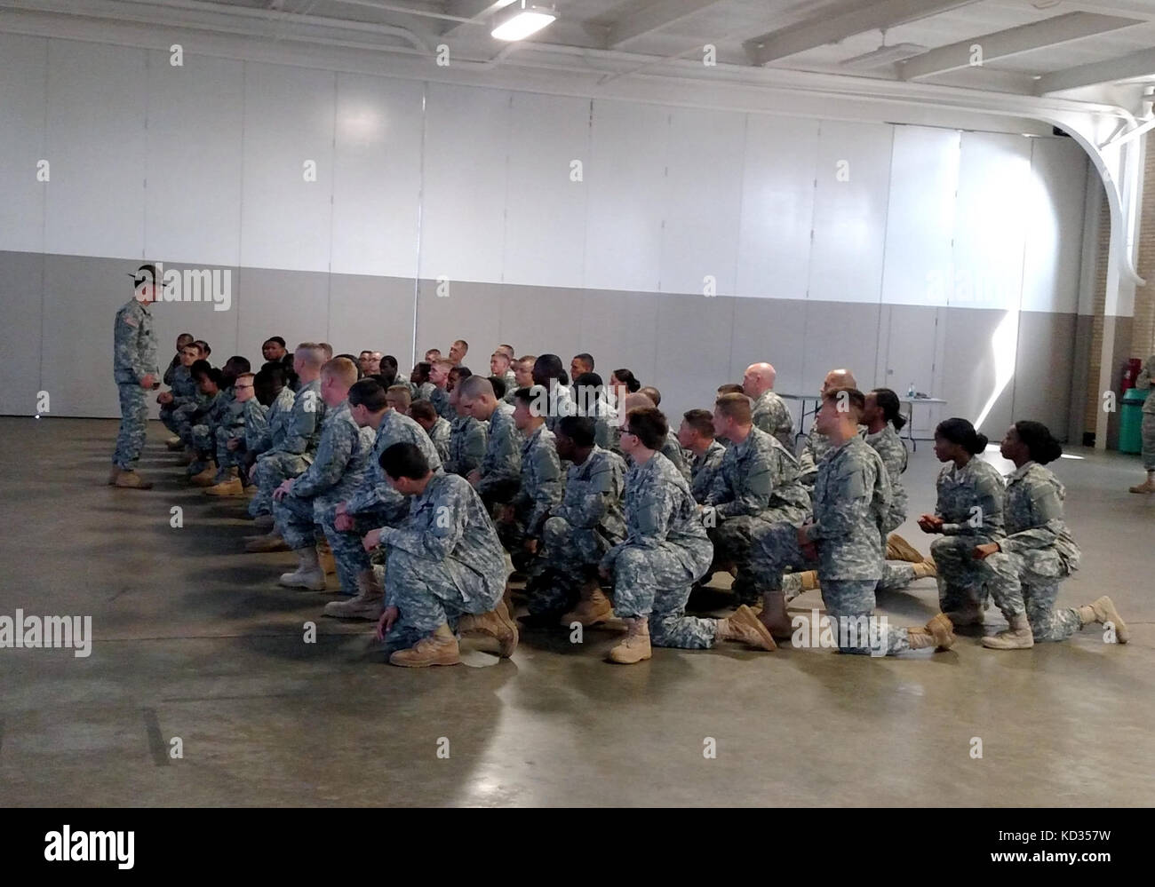 U S Soldiers Attached To Recruiting And Retention Command South Carolina Army National Guard Take A Knee As Their Drill Sergeant Provides Instruction Before Their Patch Ceremony Held At The Bluff Road Armory
