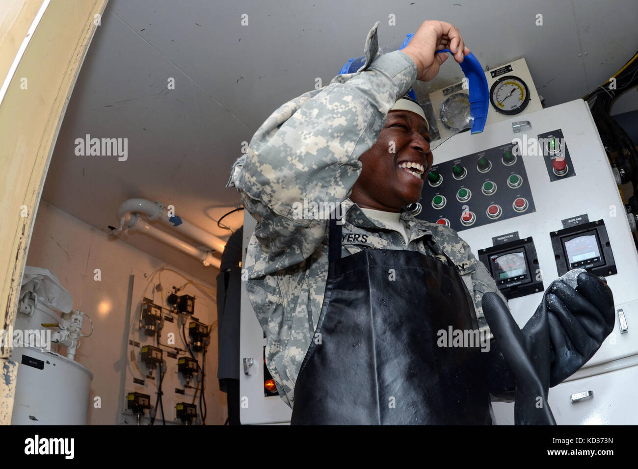 U.S. Army Spc. Keisha Myers, a water purification specialist assigned