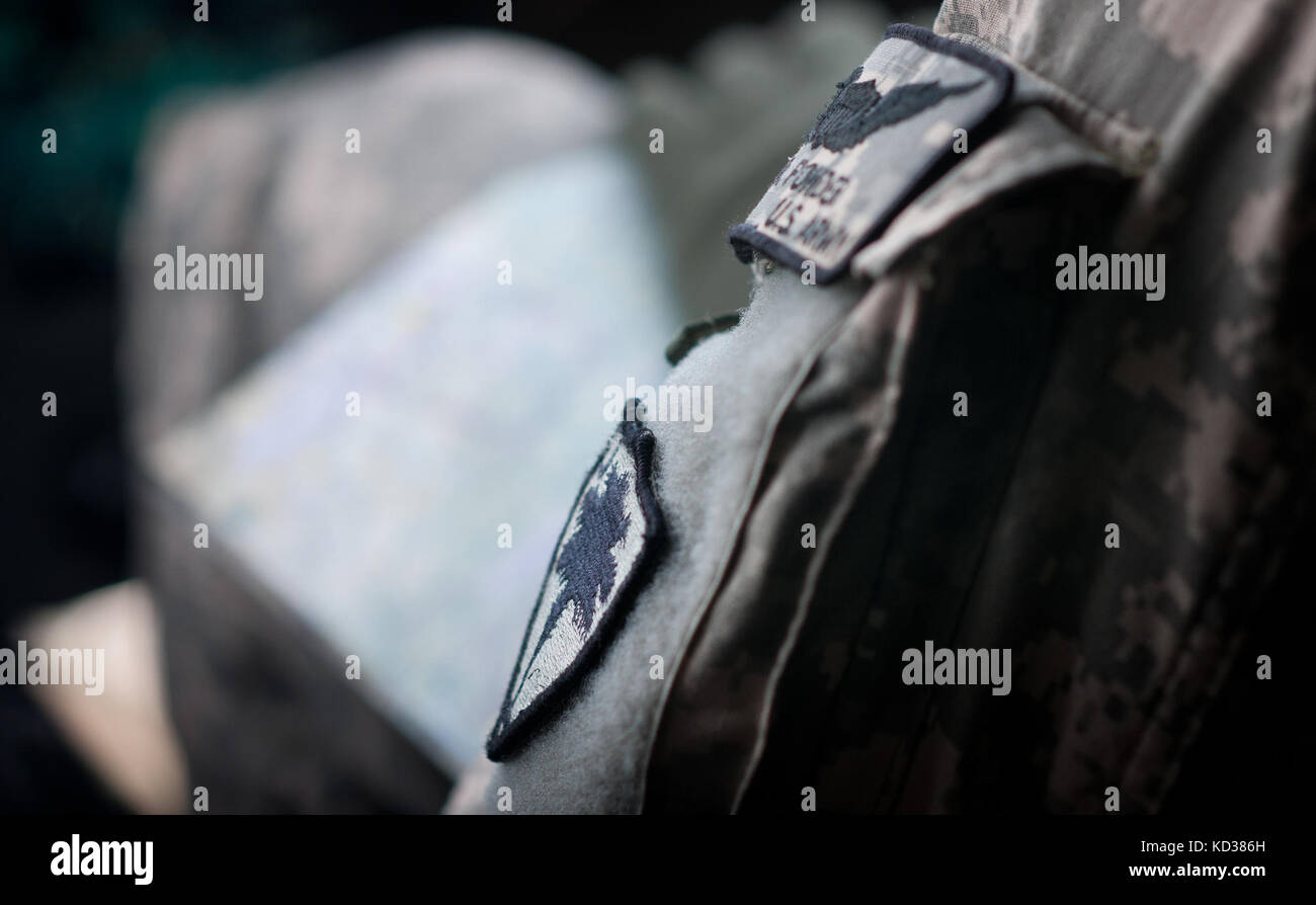 U.S. Army Cpt. Jon Strickland, Warrant Officer Eric Ponder, and Staff